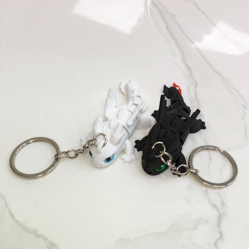 Pareja de llaveros Articulados de Chimuelo y Furia Luminosa